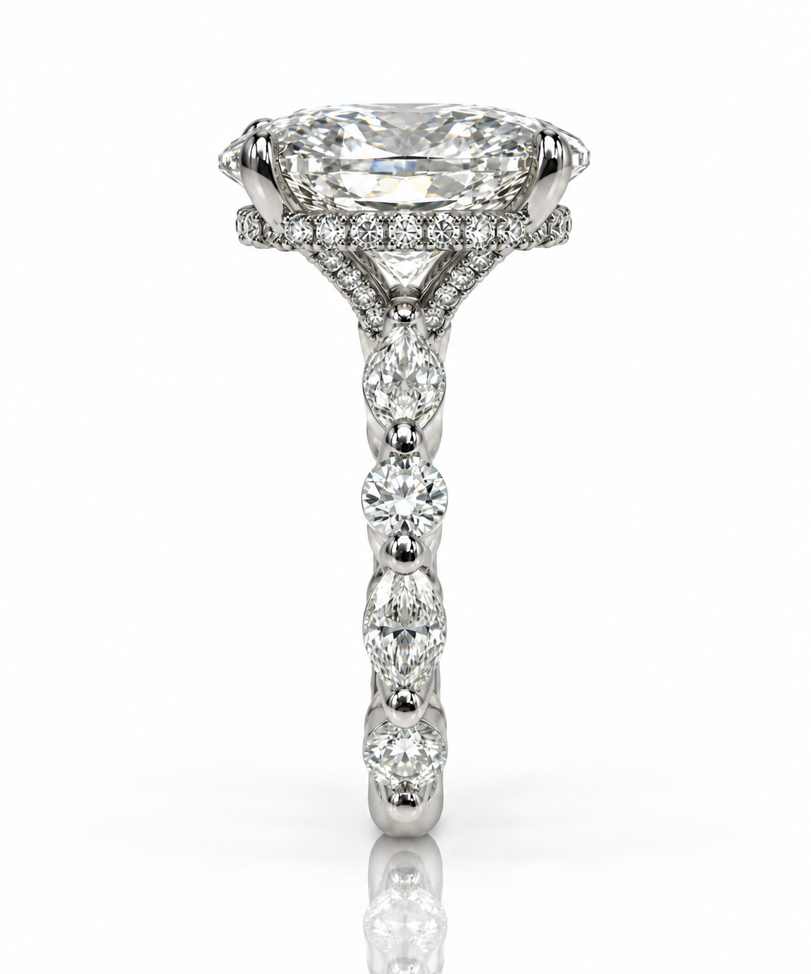 Four-Prong Oval Cut Engagement Ring with Marquise and Round Diamond Band