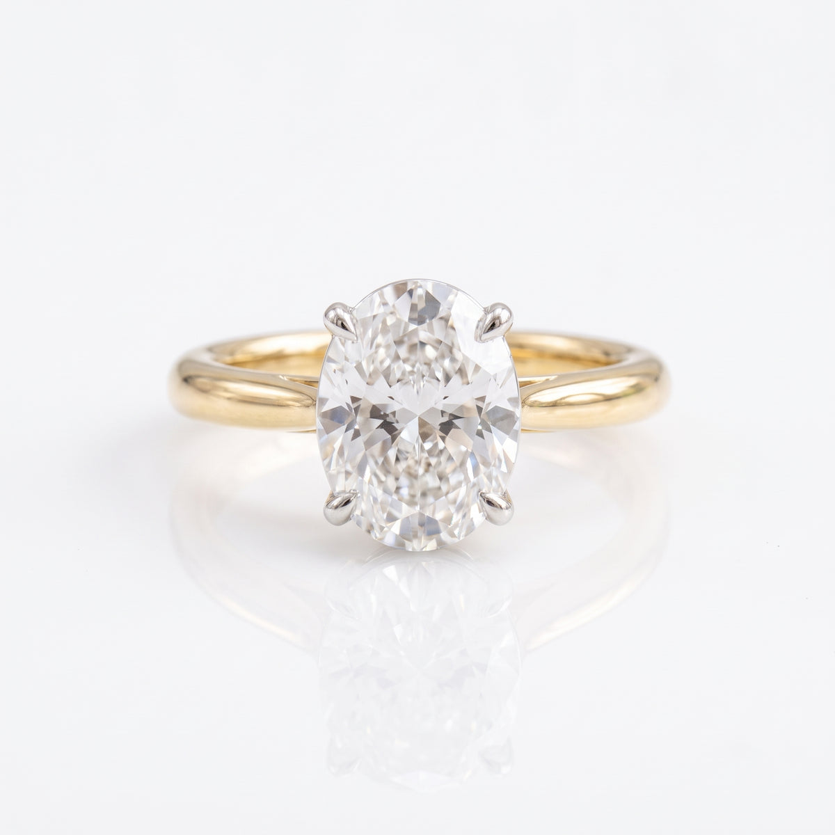 Two-Tone Oval Solitaire Engagement Ring